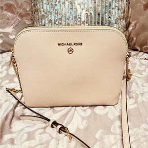 Light pink Micheal kors crossbody purse